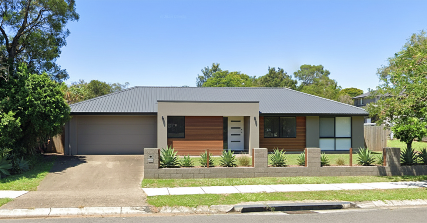 After - exterior transformation: Design type: exterior. Style Ref: None. Instructions: I want to modernize the facade of this house. the garage is at the side of the house not the front
