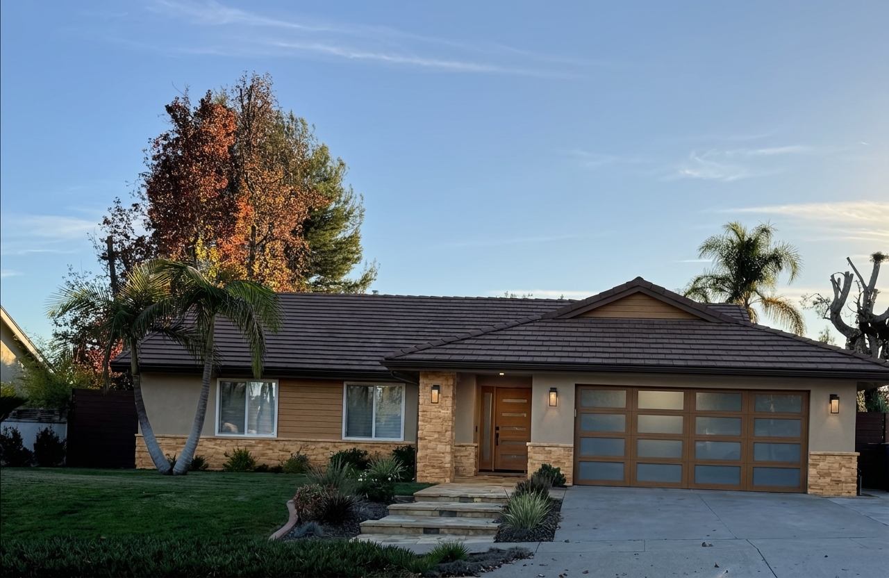 After - exterior transformation: replace brick with other material