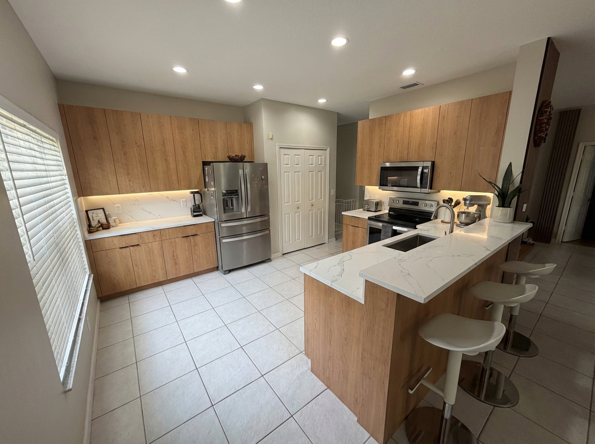After - interior transformation: modern cabinets with a light warm wood color